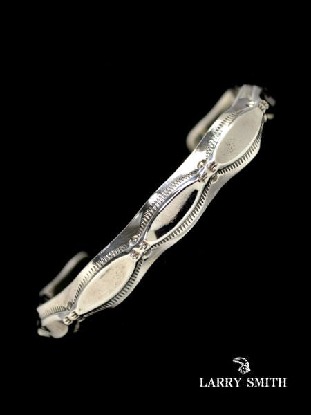 LARRY SMITH PRESS BRACELET