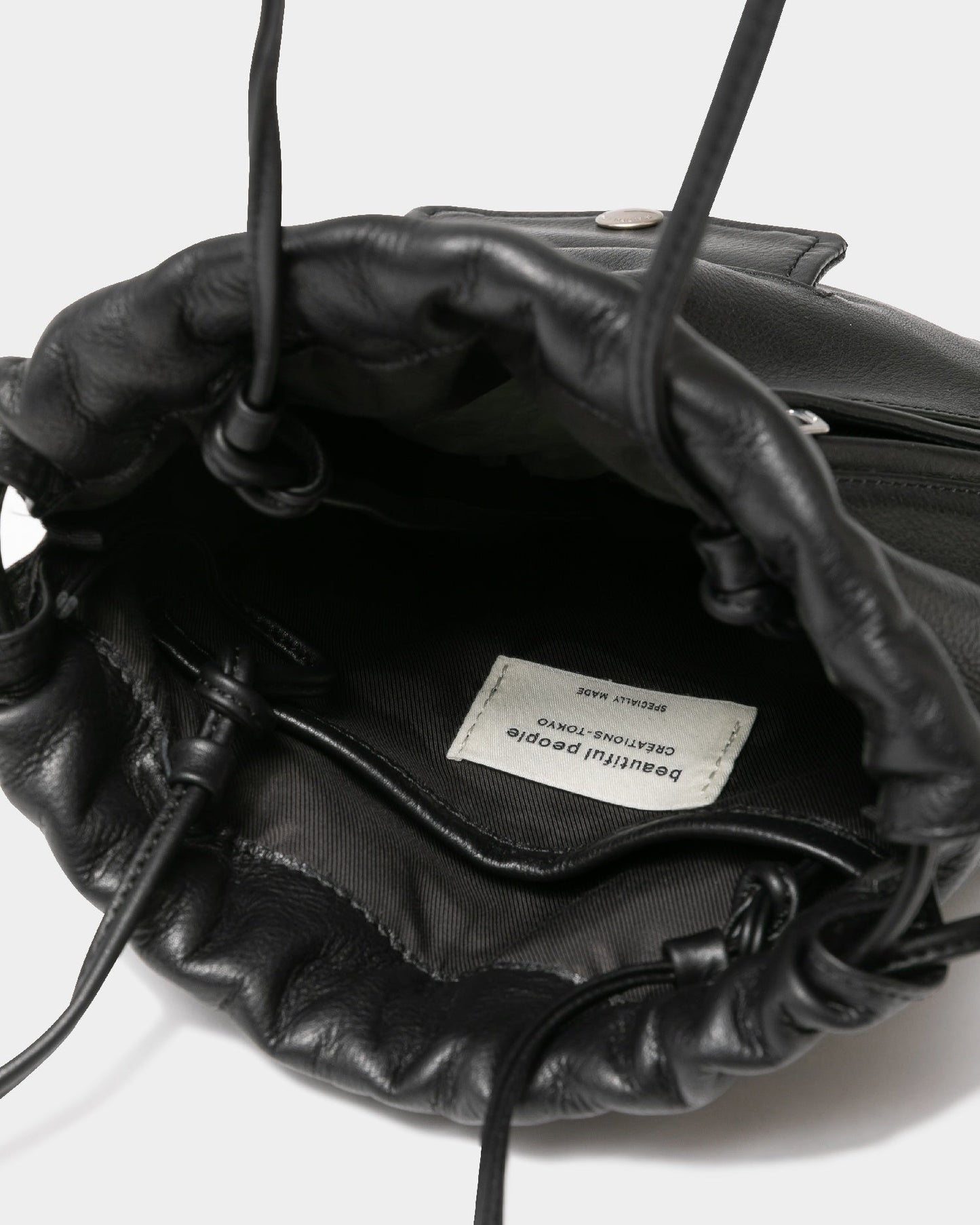 beautiful people excerption riders drawstring bag