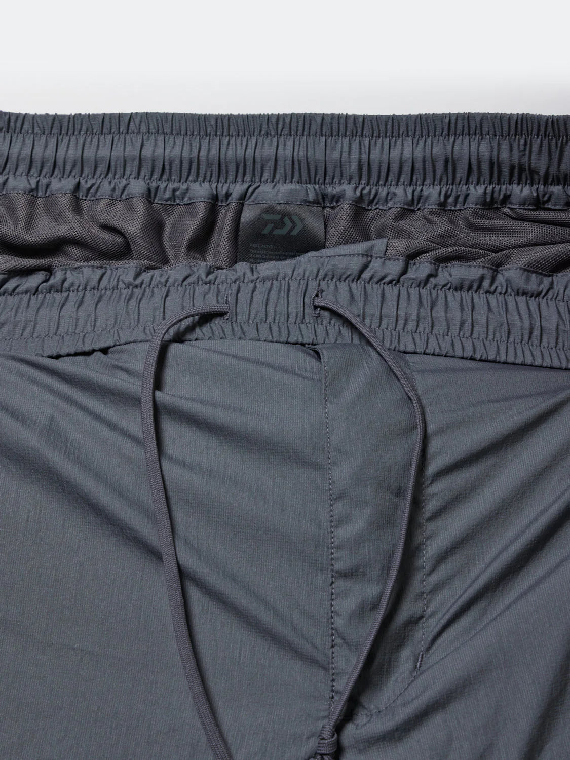 DAIWA PIER39 TECH DECHATABLE WINDBREAKER PANTS