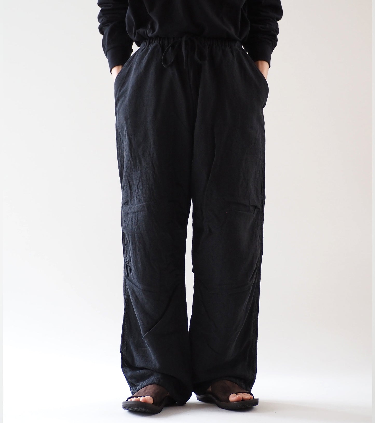 COMOLI Faded Black Knee Tuck Pants