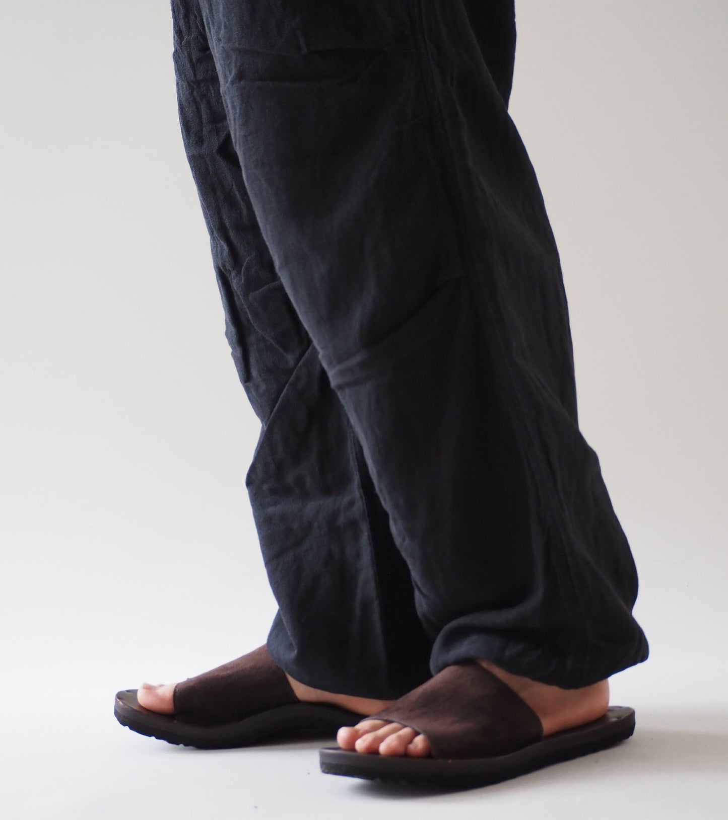 COMOLI Faded Black Knee Tuck Pants