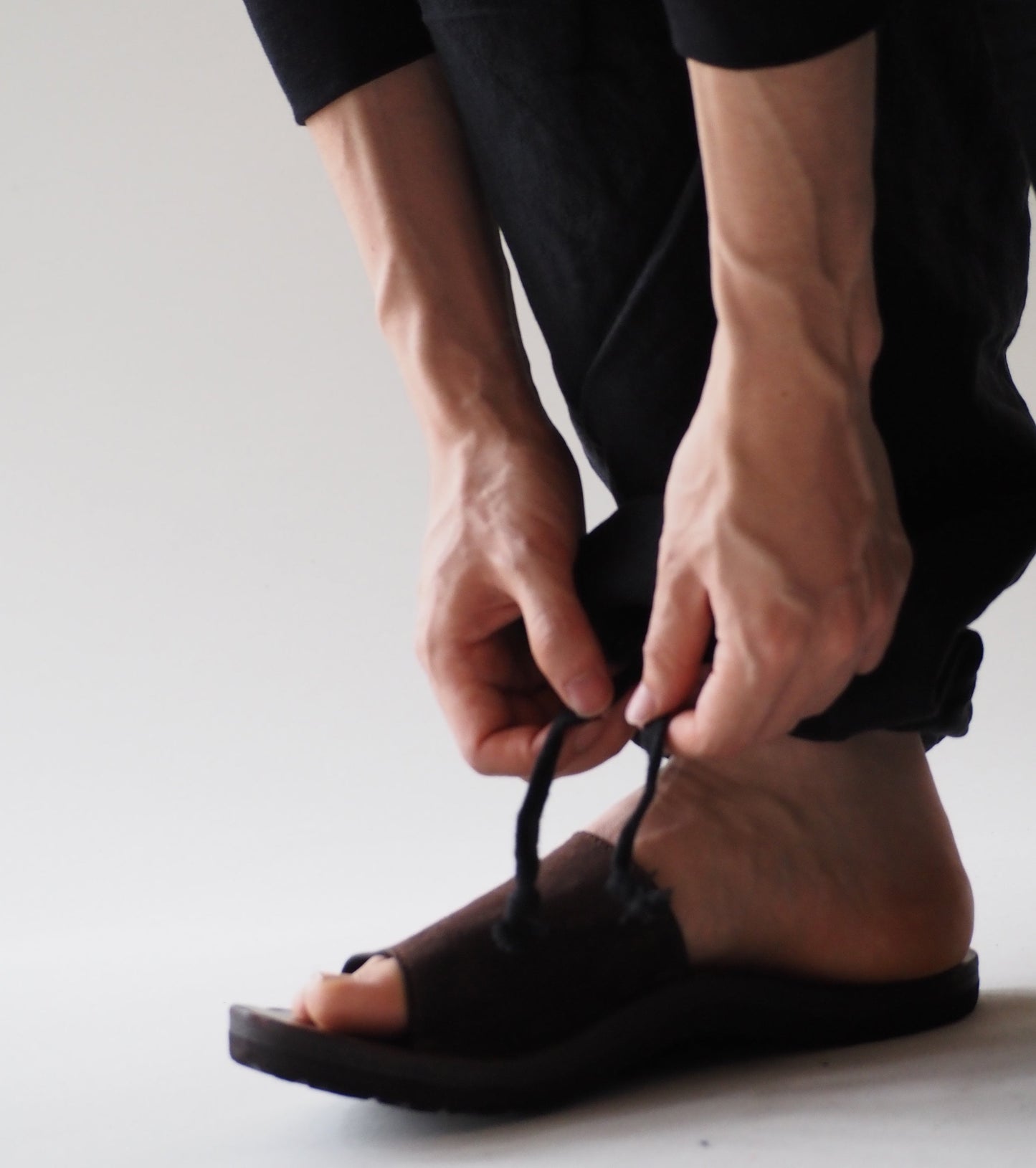 COMOLI Faded Black Knee Tuck Pants