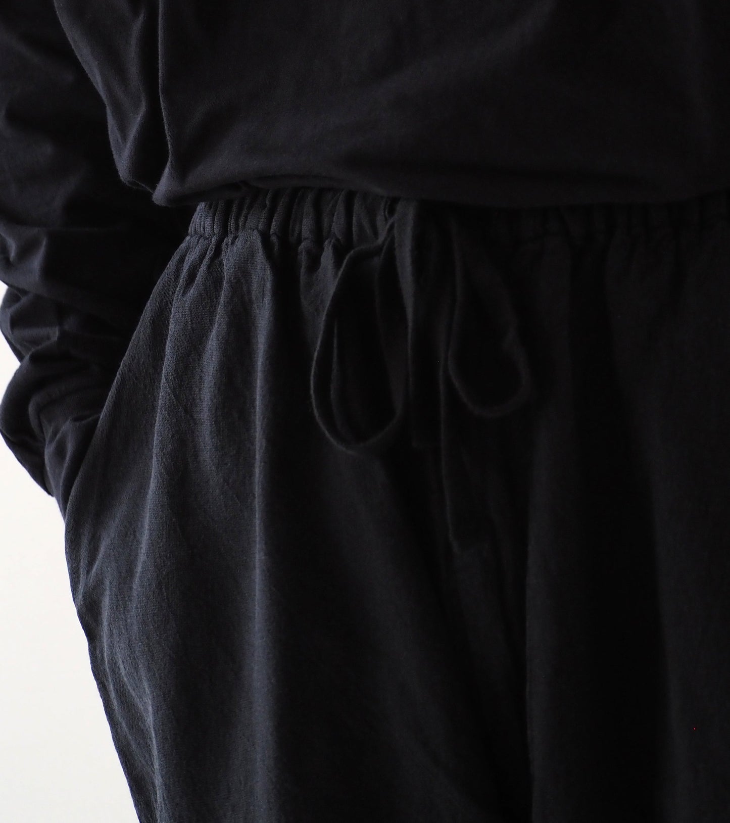 COMOLI Faded Black Knee Tuck Pants