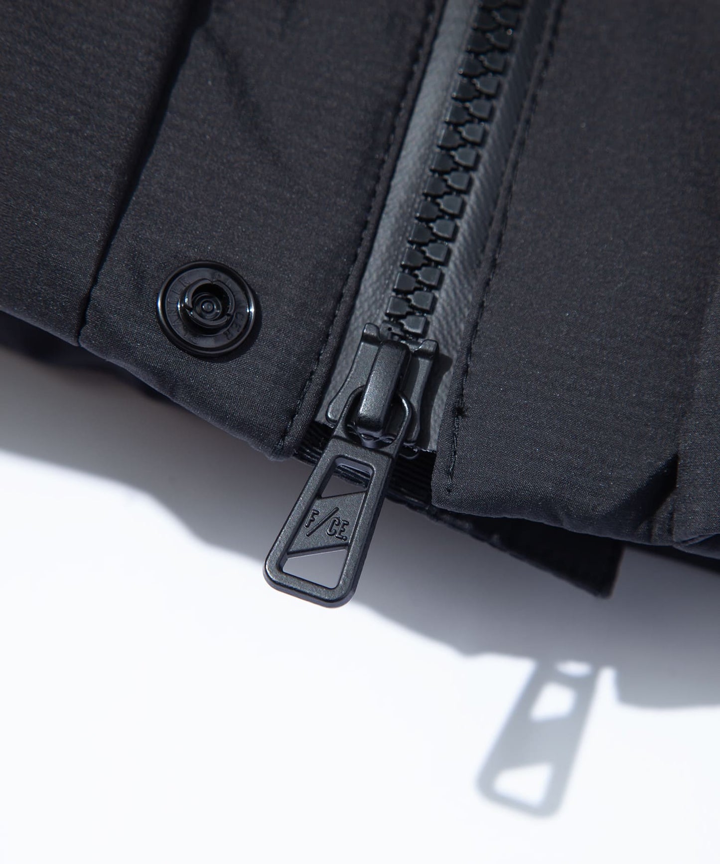 F/CE. × NANGA FT MINIMAL DOWN PARKA