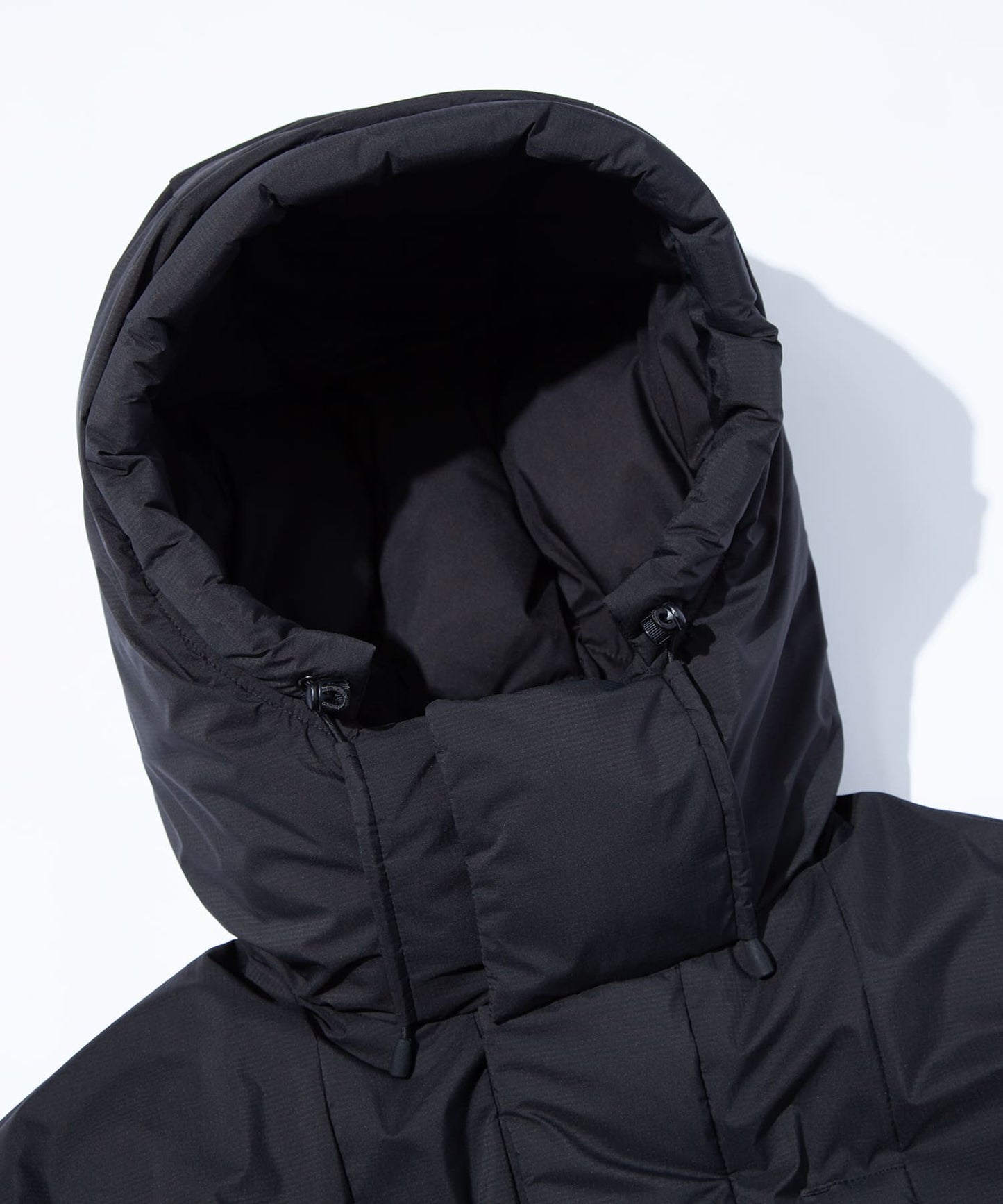 F/CE. × NANGA FT MINIMAL DOWN PARKA