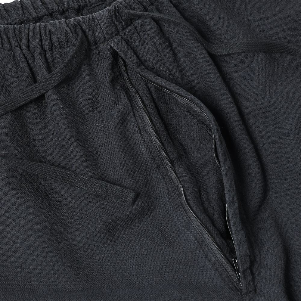 COMOLI Faded Black Knee Tuck Pants