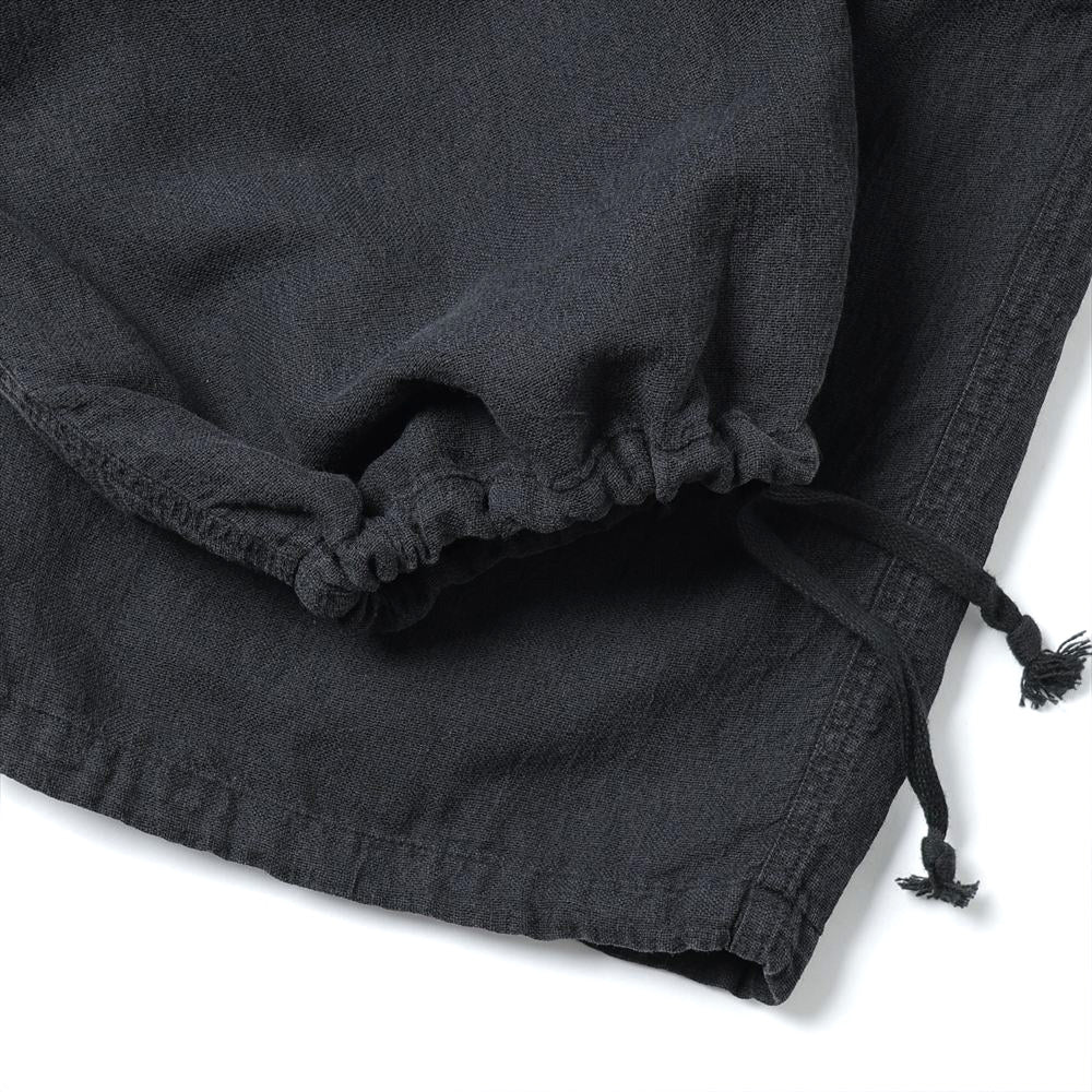 COMOLI Faded Black Knee Tuck Pants