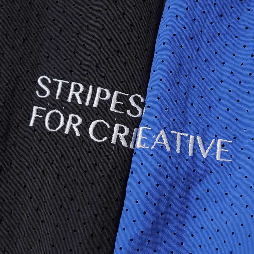 S.F.C (STRIPES FOR CREATIVE) PUNCHING NYLON HOODY