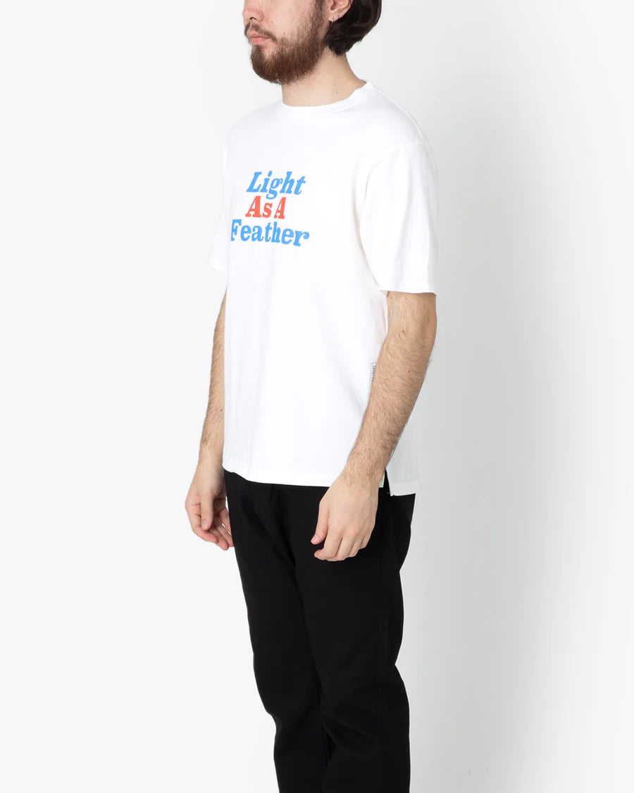 nonnative DWELLER S/S TEE "LIGHT AS A FEATHER"